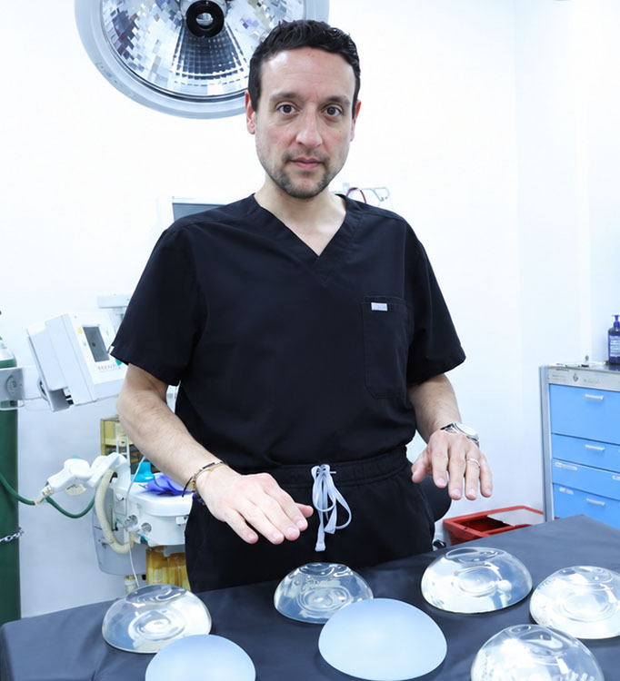 Dr. David Shokrian reviewing breast implant options for breast revision surgery in NYC